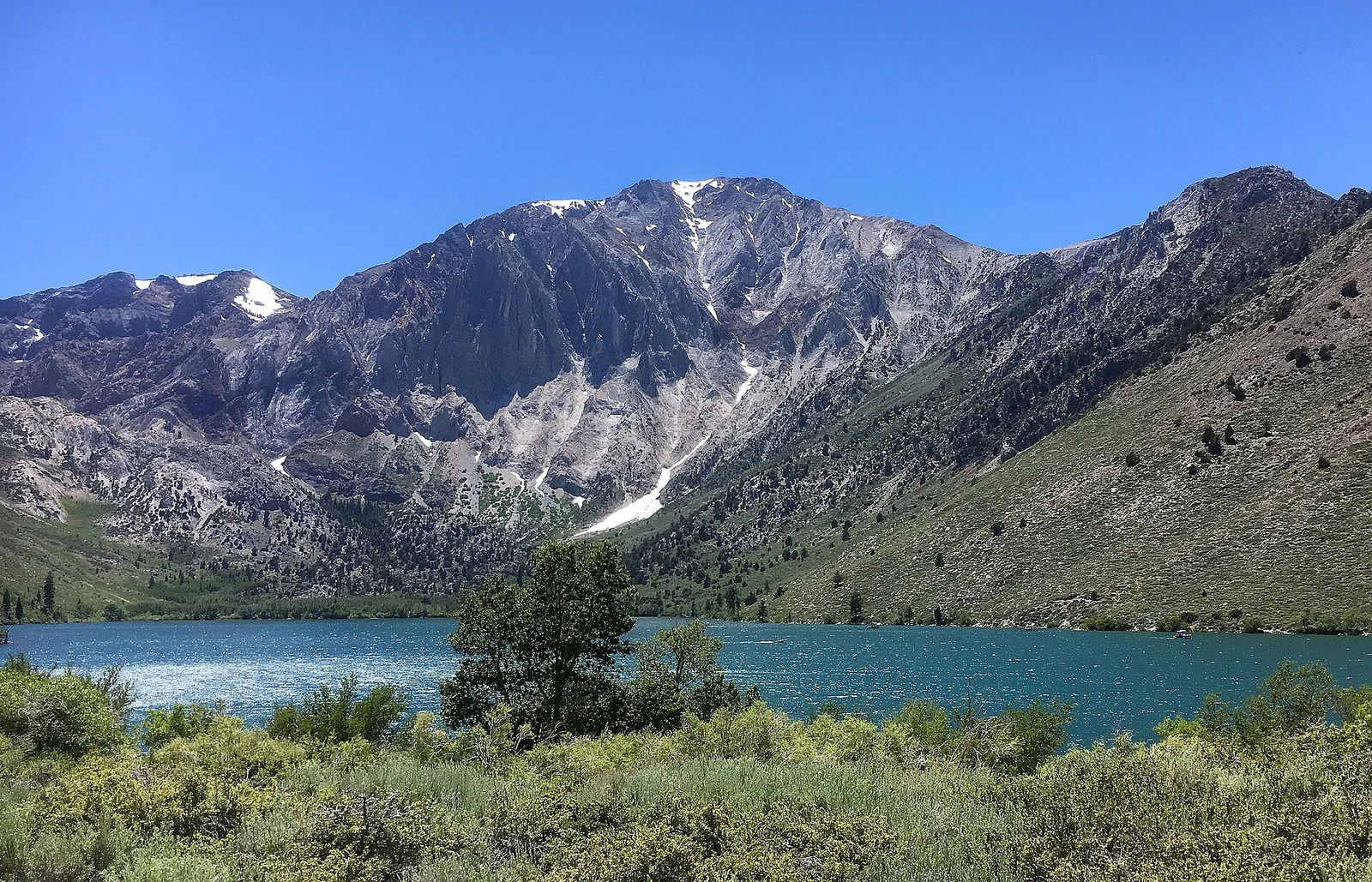Convict Lake with Mount Morrison rising behind the shoreline.